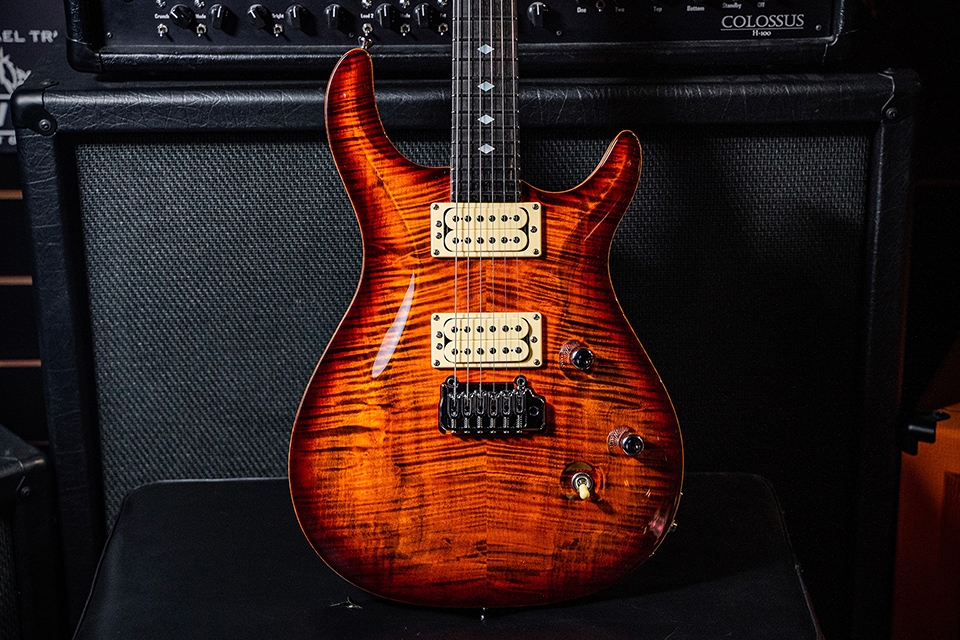 Kiesel Guitars CT6 tremolo CT6X with flamed maple top, orange burst finish, cream bezels, cream pickup coils, chrome hardware, mother of pearl diamond inlays, ebony fingerboard, natural body binding BBE