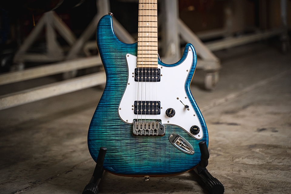 Kiesel Guitars Delos tremolo D6X with california aqua burst finish, white pickguard, chrome hardware, black plastic knobs, maple fingerboard, mother of pearl dot inlays