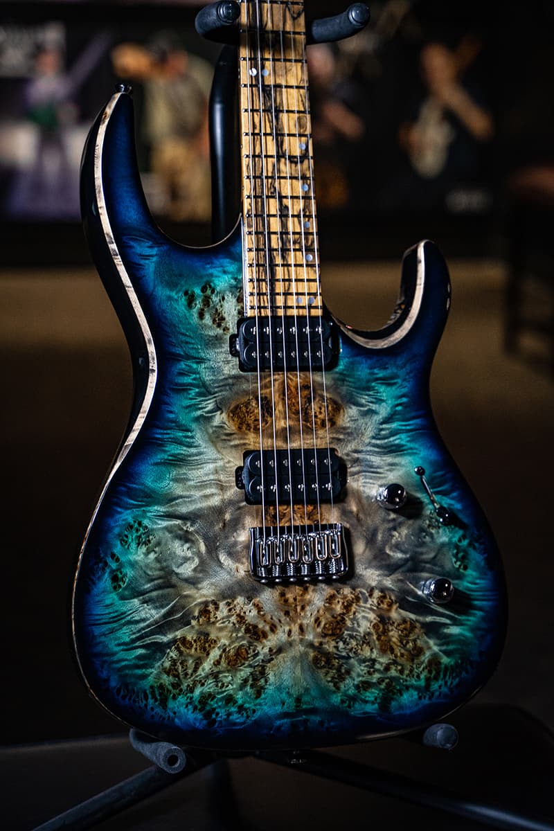 Kiesel Guitars DC DC600H with california aqua burst finish, black burst edges, palemoon ebony fingerboard, beveled edges, natural deep top wood body binding, chrome hardware, abalone staggered offset dot inlays