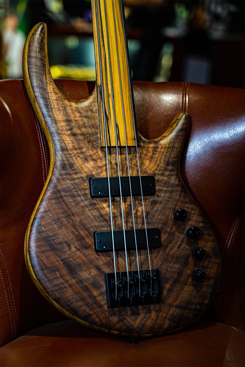 /Kiesel Guitars Icon 4 String Bass with master grade cocoboa top, black limba body, 