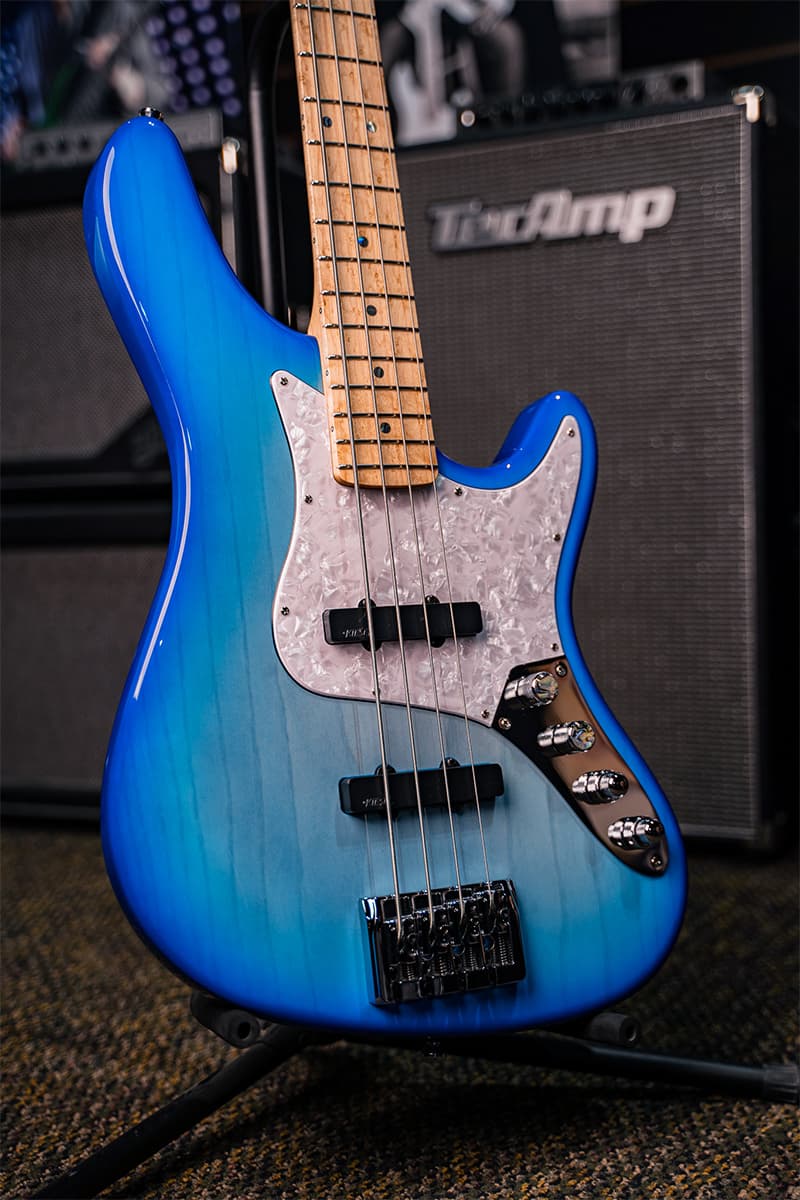 /Kiesel Guitars J-Bass 4 string With translucent aqua burst finish, swamp ash body, white pearloid pickguard, chrome hardware, abalone dot inlays, maple fingerboard, JVA pickups