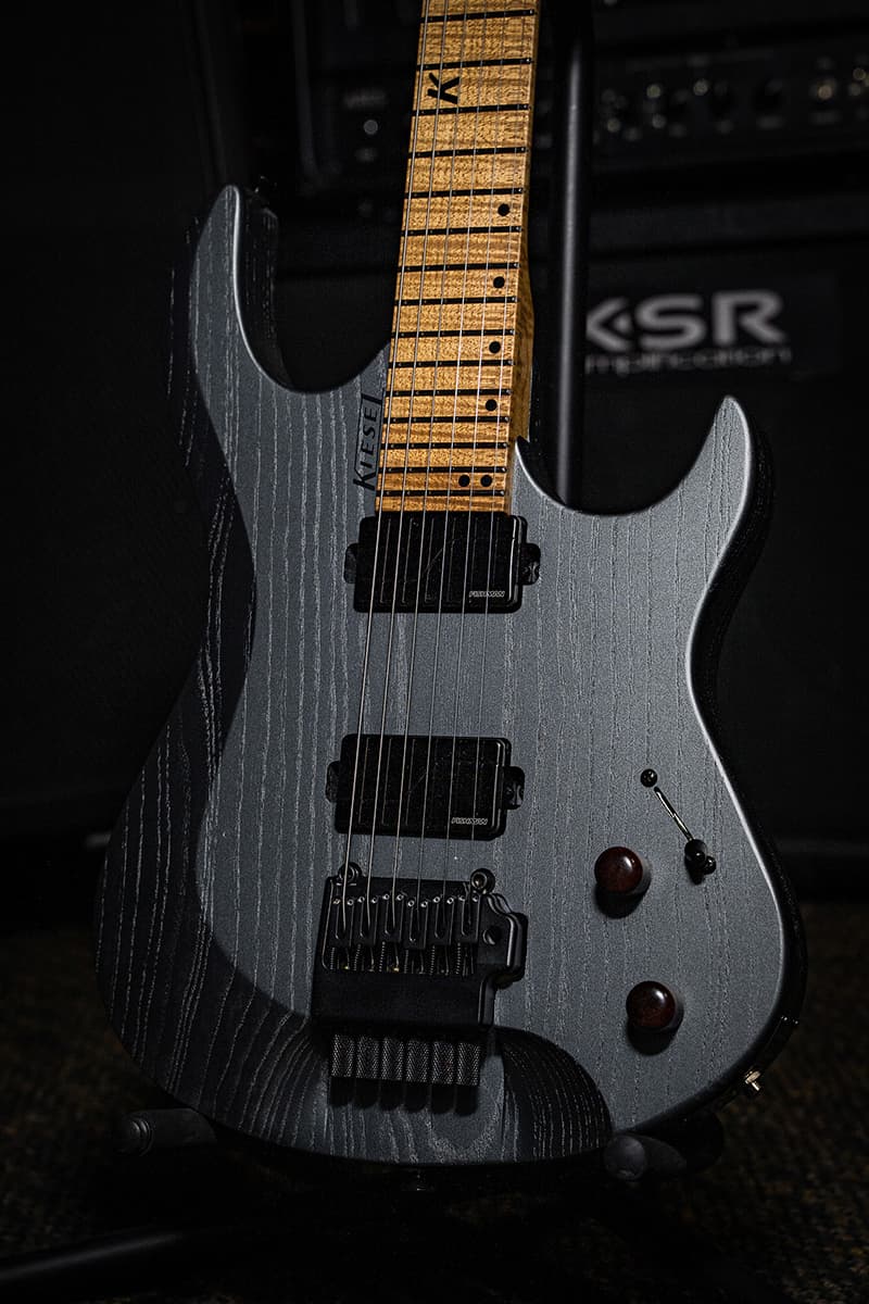 Kiesel Guitars Osiris tremolo O6X with swamp ash body, jet black finish, raw tone top coat, roasted flamed maple fingerboard, black acrylic 12th fret K logo staggered offset dot inlays, black logo, fishman pickup ACF