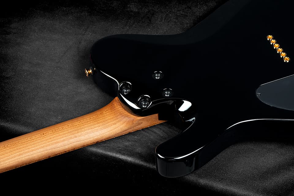 Kiesel Guitars Solo tremolo S6X neck heel with swamp ash body, antique ash treatment, 3 piece walnut neck with maple stripe, black hardware