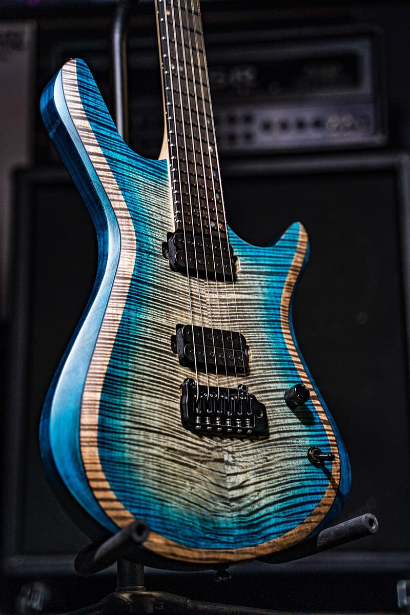 Kiesel Guitars Vanquish tremolo KV6X with flamed maple top, california aqua burst finish, deep natural top wood binding DBBEB, ebony fingerboard, swamp ash body, black hardware, black pole pieces