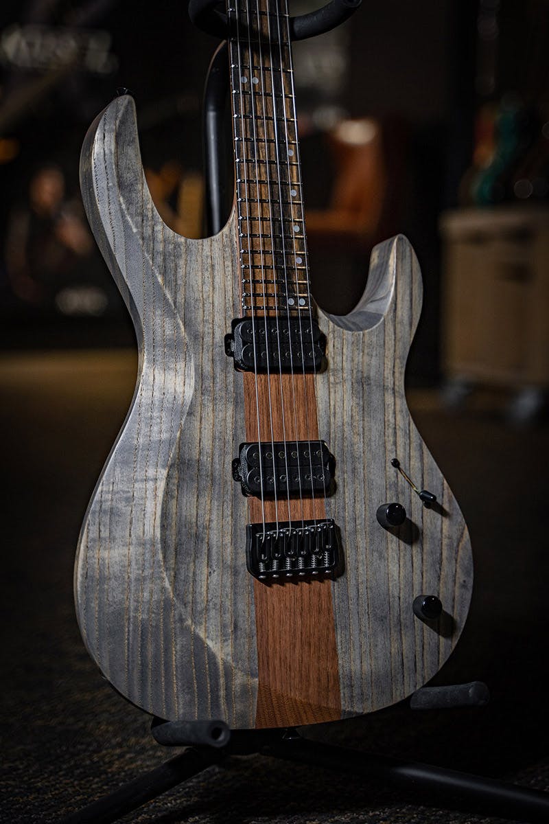 Kiesel Guitars Aries Neck-Through (NA6H) With swamp ash body, antique ash treatment, black hardware, walnut neck, royal ebony fingerboard, staggered offset mother of pearl dot inlays, raw tone top coat 