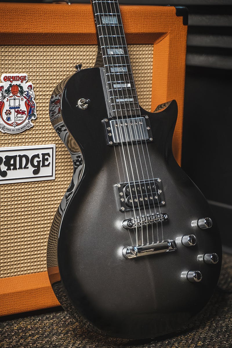 Kiesel Guitars CS3M with gunmetal metallic finish, custom black burst edges, chrome hardware, chrome neck pickup cover, mother of pearl block inlays, ebony fingerboard, black bezels