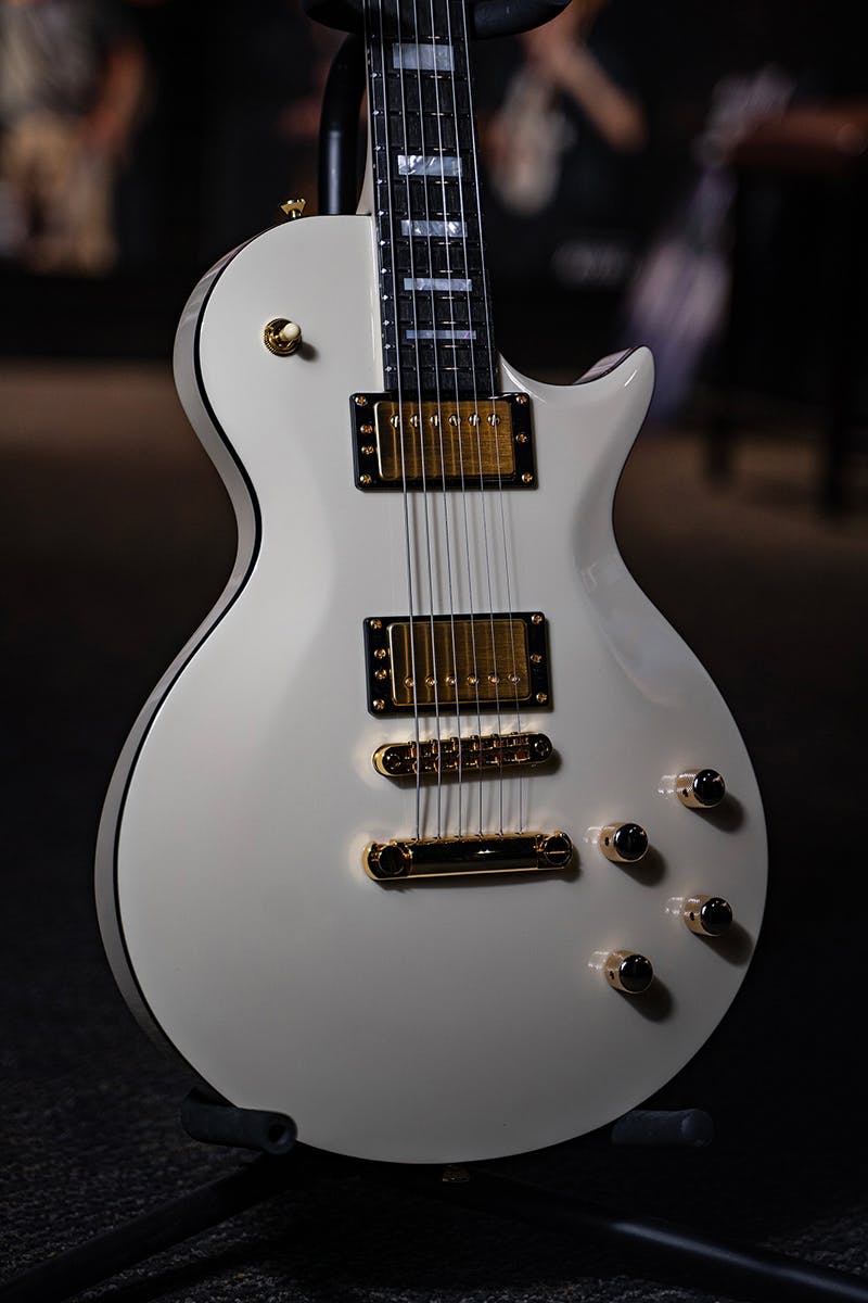 Kiesel Guitars CS3M with white/white finish, ebony (less color variation) fingerboard, gold hardware, gold pickup covers, mother of pearl block inlays