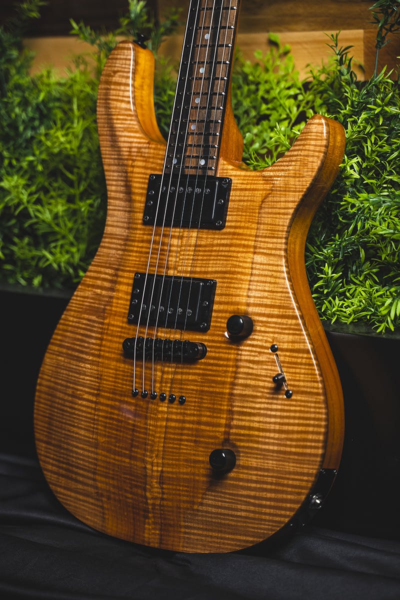 Kiesel Guitars CT6 CT6S with roasted flamed maple top, royal ebony fingerboard, black hardware, black pole pieces, mother of pearl dot inlays, mahogany body