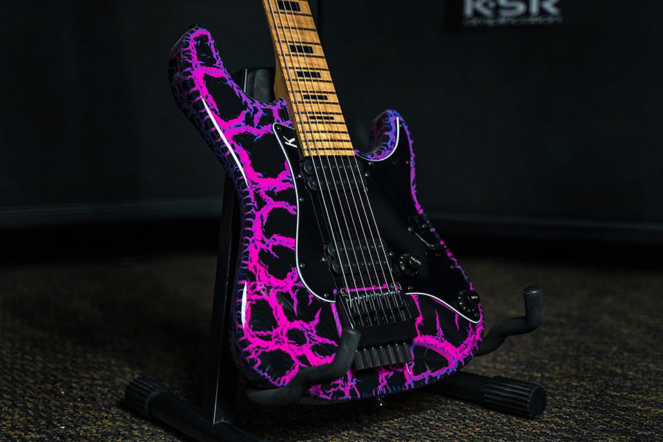 Kiesel Guitars Delos Headless 7 string tremolo HD7X with custom purple to pink fade crackle finish, maple fingerboard, black acrylic block inlays, black pickguard, black plastic knobs