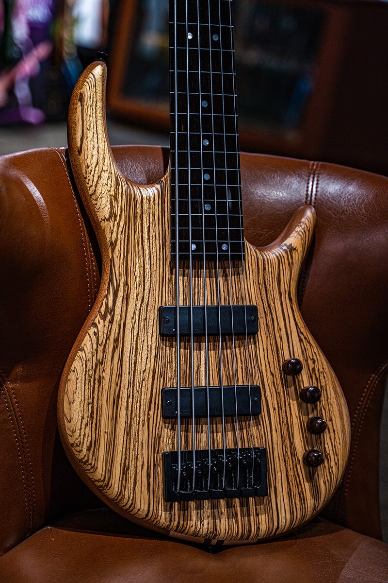 /Kiesel Guitars Icon 6 String Bass With zebrawood top, mahogany body, 5 piece maple neck with 2 mahogany stripes, ebony fingerboard, mother of pearl dot inlays, wooden knobs, kiesel radius pickups