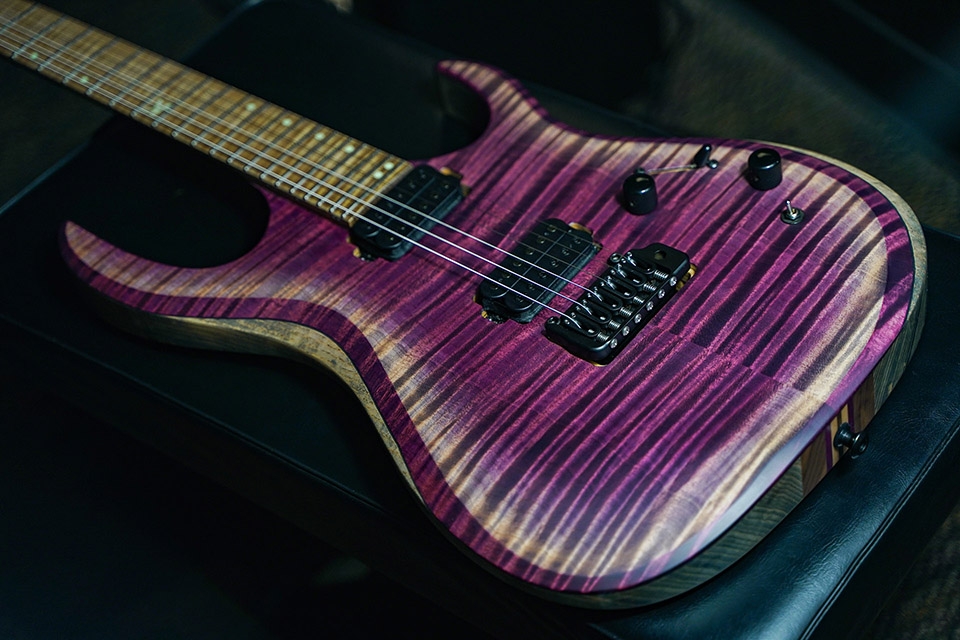 Kiesel Guitars K-Series tremolo K6X with master grade flamed maple top, pink arctic finish, black pole pieces, roasted flamed maple fingerboard, white acrylic 12th fret K logo staggered offset dot inlays, swamp ash body, antique ash treatment