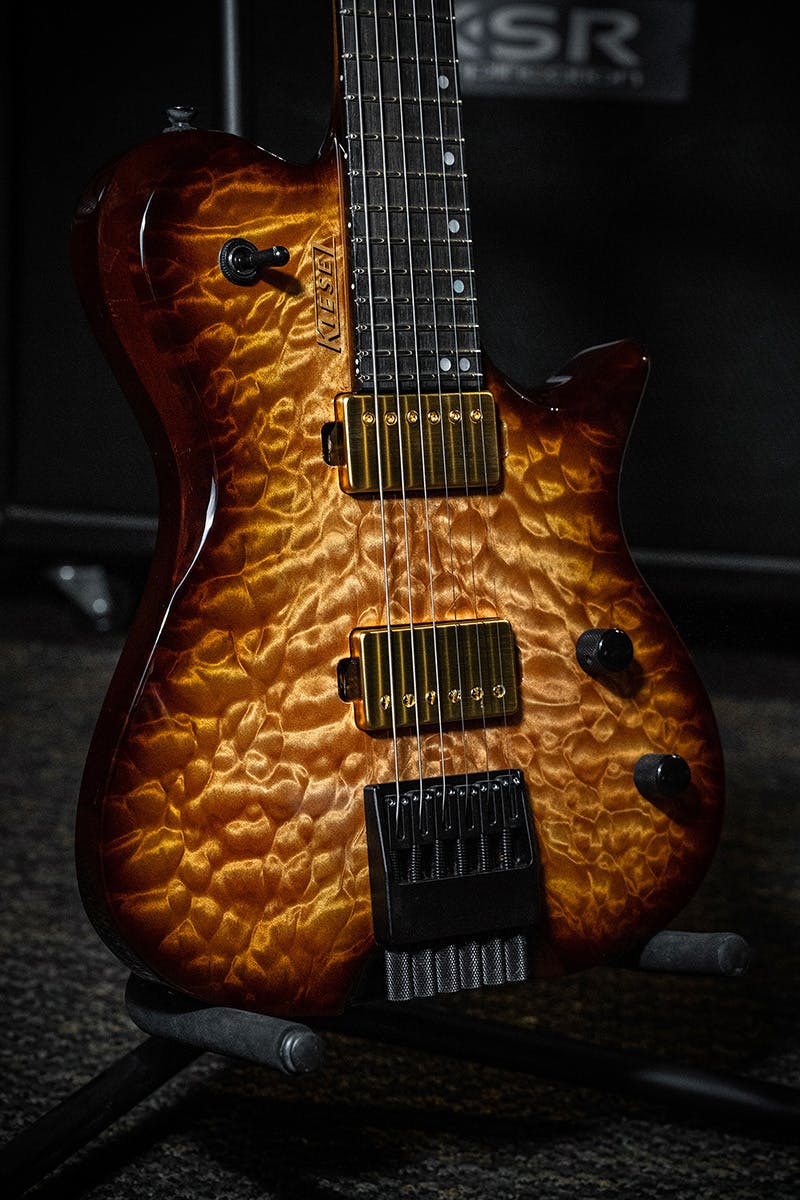 Kiesel Guitars Leia L6 with quilted maple top, gold pickup covers, gold pole pieces, california honey burst finish, gold logo, ebony fingerboard, mother of pearl staggered offset dot inlays