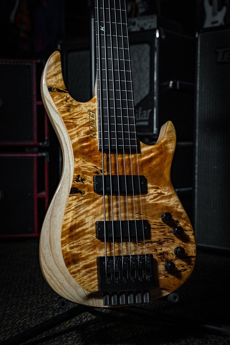 Kiesel Guitars Osiris Bass 6 String With custom wood top, gold logo, swamp ash body, ebony (less color variation) fingerboard, abalone 12th fret k logo inlay, satin matte