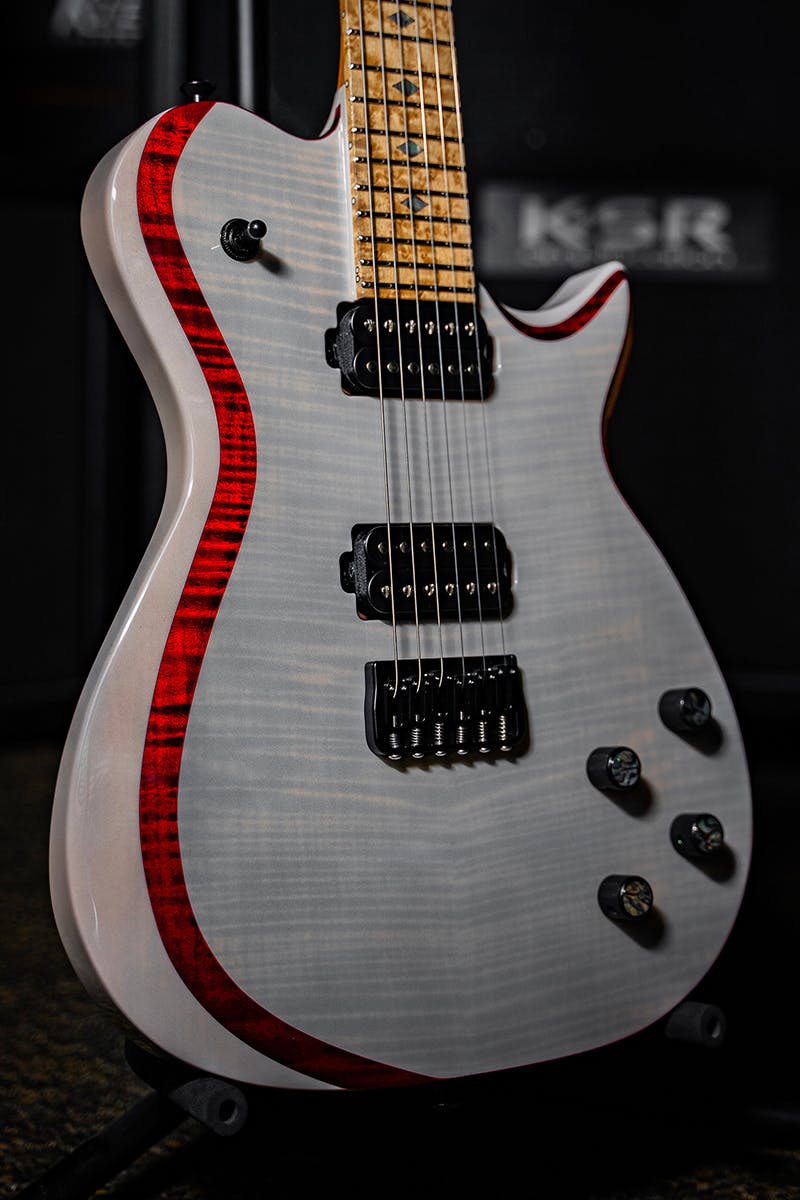 Kiesel Guitars SCB SCB6H with flamed maple top, translucent white finish, translucent red binding effect, birdseye maple fingerboard, mother of pearl diamond inlays, black hardware