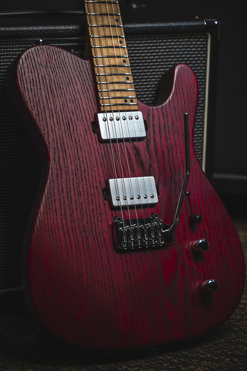 Kiesel Guitars Solo tremolo S6X with swamp ash body, scarlet red stain, raw tone top coat, chrome pickup covers, chrome hardware, maple fingerboard, black acrylic staggered offset dot inlays