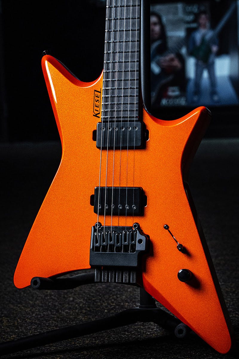 Kiesel Guitars Type-X X6X tremolo with lambo orange metallic finish, black pickup covers, richlite diamond black fingerboard, no top inlays NIN, black pole pieces, black logo