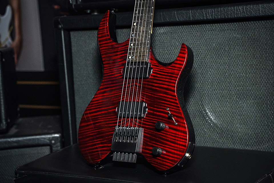 Kiesel Guitars Vader V6 tremolo with wine stain over flamed maple top, black hardware, black pickup covers, ebony fingerboard, mother of pearl offset dot inlays