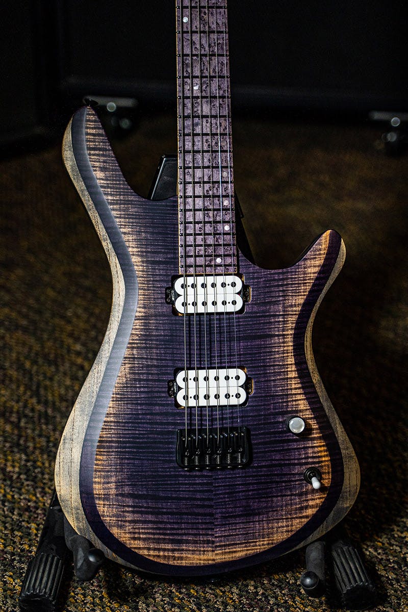 Kiesel Guitars Vanquish KV6H with flamed map top, purple arctic finish, purple kiesel treated fingerboard KTB, white pickup coils, white pearl knob inlay, swamp ash body, antique ash treatment, rear natural clear RNC