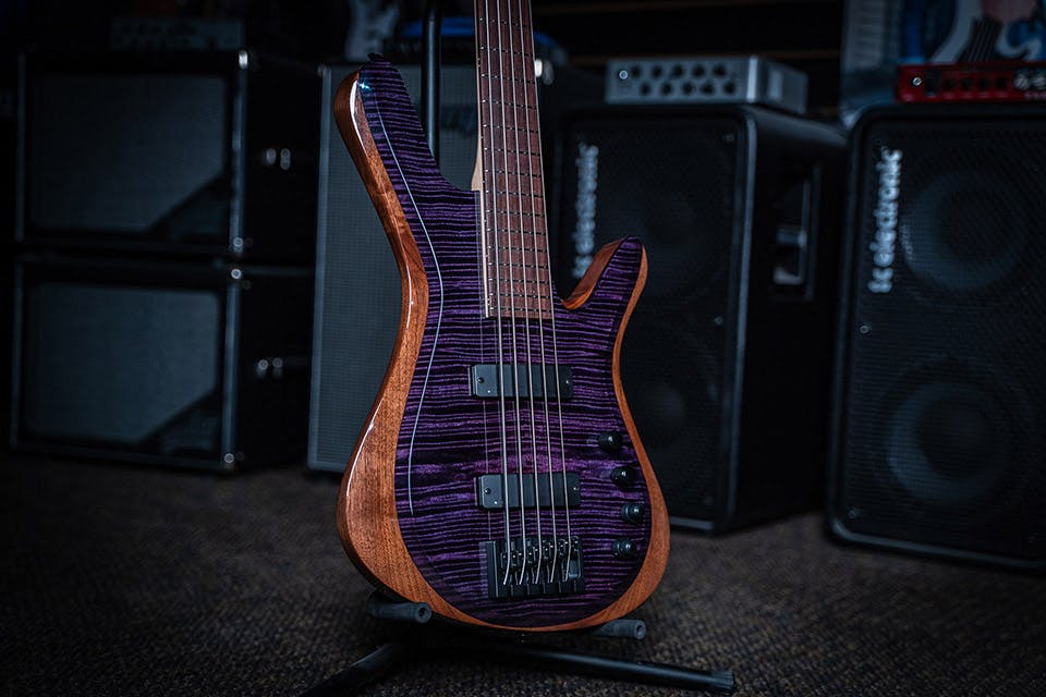 /Kiesel Guitars Vanquish Bass 4 String with flamed mapel top, translucent purple finish, walnut body, rosewood fingerboard, no top inlays NIN, black hardware, rear of body natural clear RNC