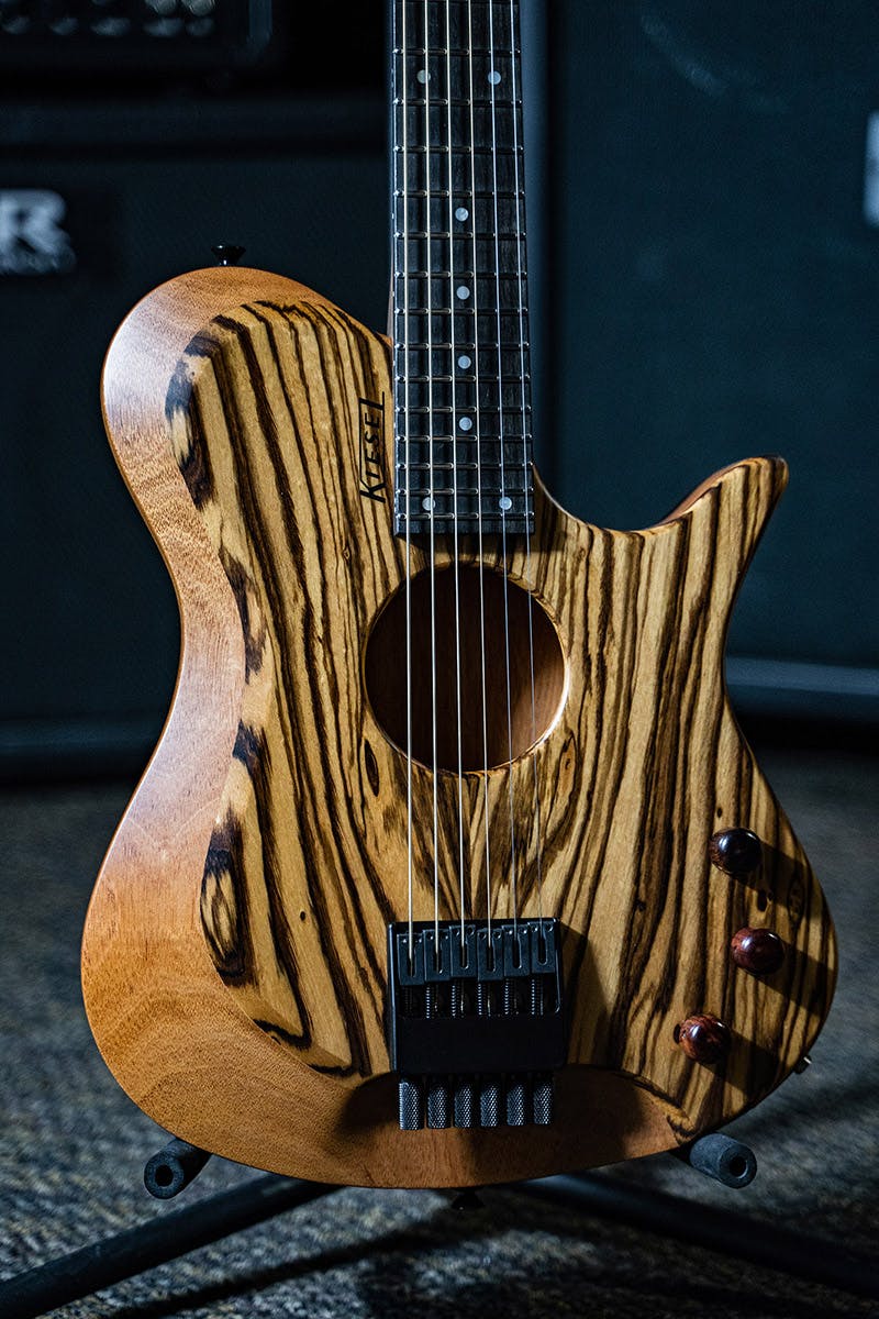 Kiesel Guitars Zeus Acoustic ZA6 with zebrawood top, wood knobs, black logo, mahogany body, ebony less color variation fingerboard