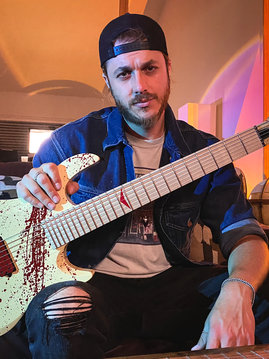 Dan Sugarman of Ice Nine Kills with his special edition Voorhees guitar
